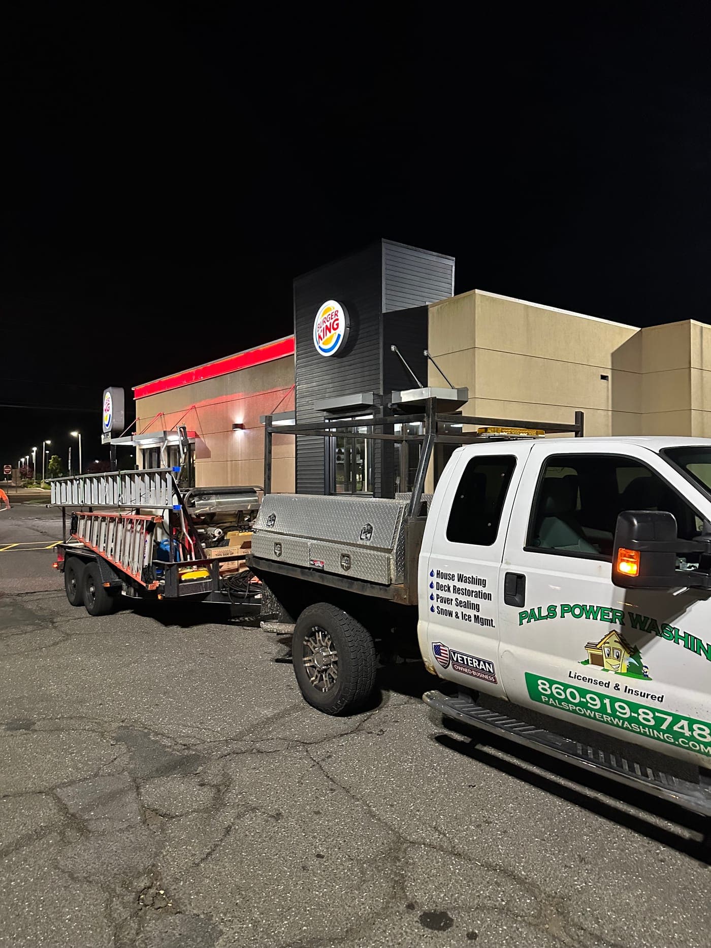 Pals Power Washing truck and trailer on a commercial night job